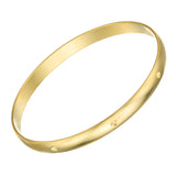 Susan Shaw: Gold Bangle Bracelet