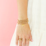 Beaded Bracelet w/ Gold Bow Charm